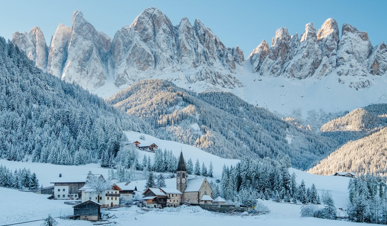 The small village in Dolomites mountains in winter.