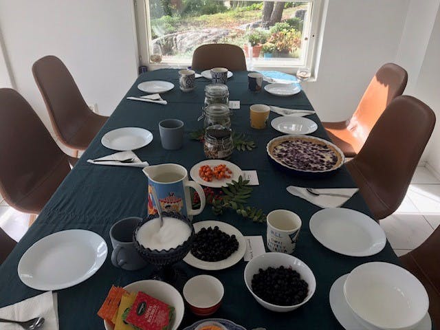 Local Home dine table with blueberry pie